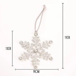 Glittering silver snowflake Christmas ornament with rhinestones for festive tree decoration