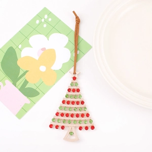 Christmas tree metal pendant with red and green rhinestones on a gold base with lanyard