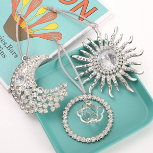 Sparkling sun and moon rearview mirror charms with rhinestones and grey suede cords