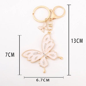 Pink butterfly keychain with crystals and gold lobster clasp, size 13x6.7cm