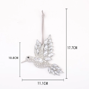 Detailed view of silver hummingbird ornament with sparkling rhinestones and dimensions