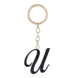 Elegant gold-plated alphabet U keychain with black enamel inlay and metal chain