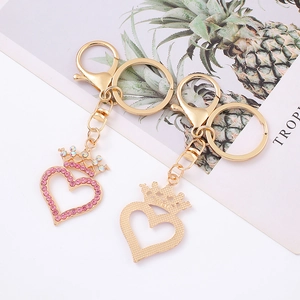 Fashion heart and crown keychain with pink rhinestones and gold alloy charms for bags