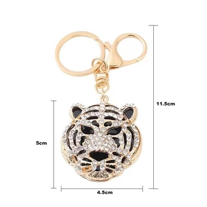 Detailed size specifications for a gold leopard head keychain with crystal rhinestones
