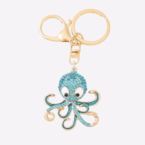 Sparkling blue rhinestone octopus keychain with golden ring and lobster clasp on white background