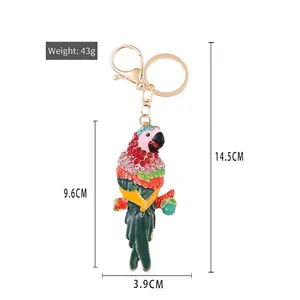 Parrot keychain with red crystals and enamel finish on gold-tone zinc alloy clasp