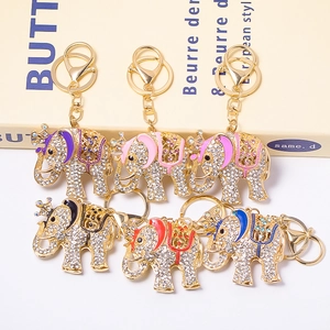Detailed view of colorful crown elephant keychains with sparkling rhinestones set