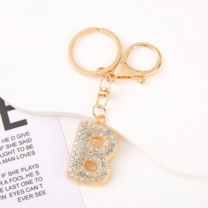 Detail of crystal encrusted letter B keychain with golden plating and lobster clasp