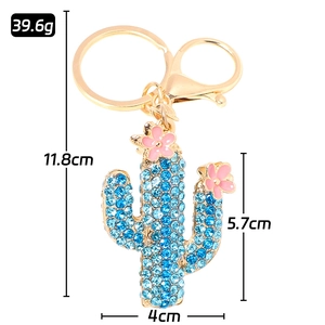 Sparkling blue rhinestone cactus keychain with pink enamel flowers and dimensions