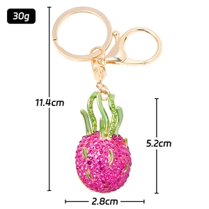 Cute pink dragon fruit keychain with sparkling rhinestones and green metal leaf pendant