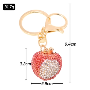 Sparkling red apple keychain with rhinestones, gold-plated ring and lobster clasp detail
