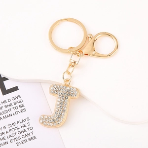 Detailed view of golden crystal letter J keychain with rhinestones and lobster clasp