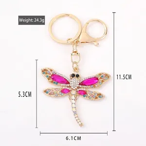 Colorful dragonfly keychain with crystal rhinestones on a gold metal base and lobster clasp