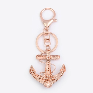 Porte-clés ancre en or rose avec strass et motifs évidés pour accessoire de sac