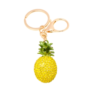 Close-up of pineapple keychain with yellow rhinestones and gold-tone lobster clasp