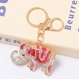 Detailed close-up of elephant keychain with sparkling rhinestones and colorful enamel work
