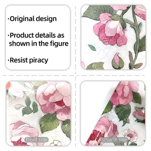 Macro detail showing embossed pink floral textures and double-sided visual effects of the film