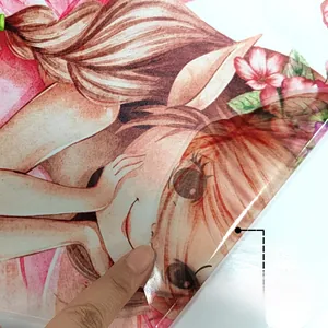 Detail of pink girl and deer wall sticker showing its adhesive backing and easy removal