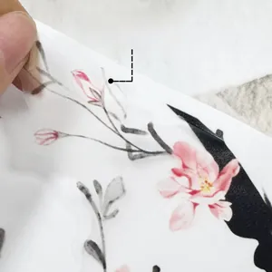 Macro detail of self-adhesive floral wall sticker with removable backing