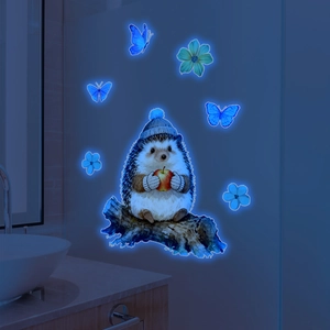 Luminous wall stickers set featuring hedgehog and blue glowing butterflies in dark room