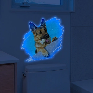 Luminous German Shepherd toilet sticker glowing in dark bathroom setting