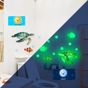 Luminous ocean themed wall stickers showing day and night glowing effect of sea turtles