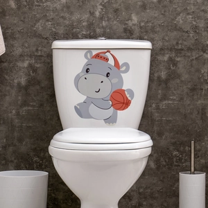 Detailed view of waterproof cartoon hippo wall sticker applied on white toilet tank