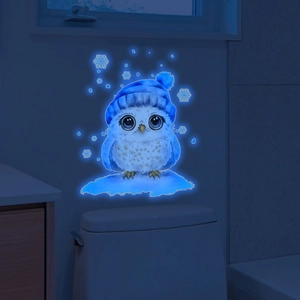 Glow in the dark wall decal featuring a cute cartoon owl with blue hat and snowflakes.