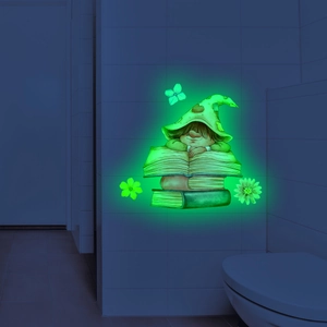 Glow-in-the-dark wall decal featuring a cartoon wizard gnome and books in a bathroom setting