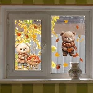 Autumn window decals featuring a cartoon bear, pumpkin cart, and maple leaves on glass