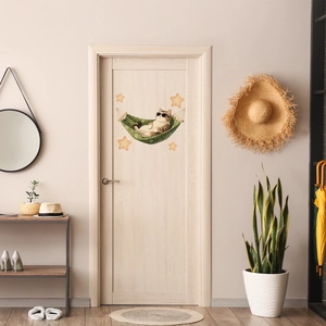 Luminous cartoon cat wall sticker on a wooden door in a modern home interior setting