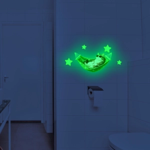 Glow in the dark wall sticker featuring a cute cat on a hammock with stars at night