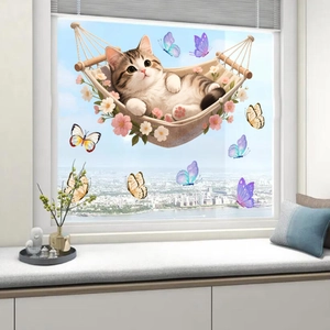 Detailed view of floral hammock cat window sticker with colorful butterfly static decals