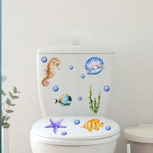 Detailed watercolor marine sea creatures stickers applied to a white toilet seat lid
