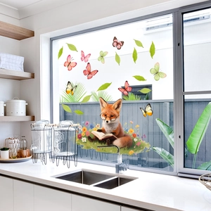 Detail of cute fox reading book static window cling sticker with colorful butterflies
