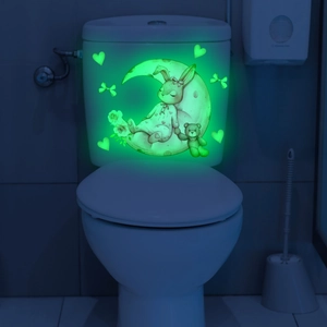 Luminous glow-in-the-dark wall sticker featuring moon, rabbit and bear on toilet tank