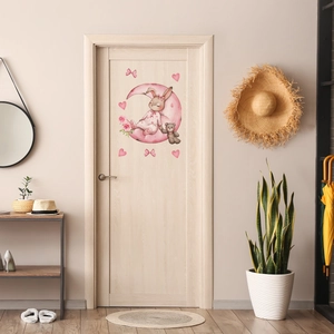 Luminous wall sticker showing a cute rabbit on a pink moon for bedroom door decoration