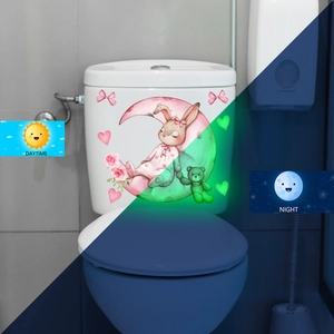 Luminous sleeping moon rabbit toilet sticker showing daytime and night glow effect