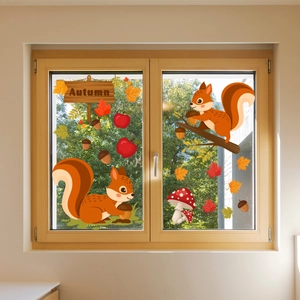 Detail of autumn squirrel and maple leaf static window stickers on a glass window