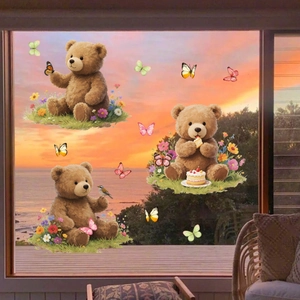 Detail of cartoon teddy bear and butterfly static window clings with hand-drawn art style