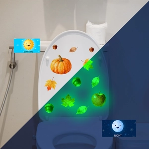 Luminous autumn pumpkin and maple leaf stickers showing daytime and nighttime glow effect