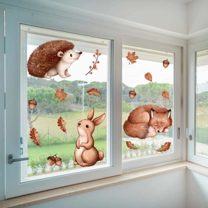 Detail of fall animal window clings featuring watercolor hedgehog and squirrel designs