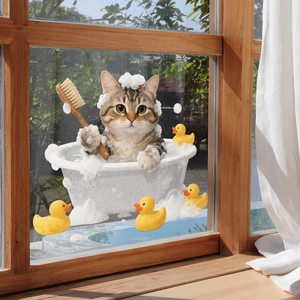 Detail of creative tabby cat bath window sticker on glass with soft natural outdoor light