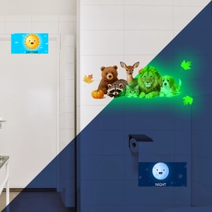 Luminous wall stickers comparison showing cartoon animals glowing in daytime and night