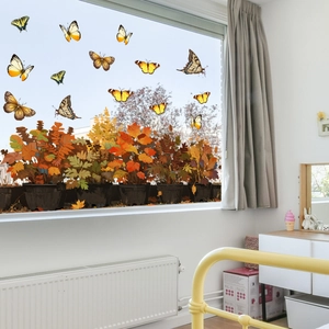 Detailed fall window stickers featuring autumn butterflies and leaf potted plants decor