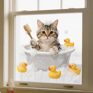 Detail of cartoon cat bathing window sticker with rubber ducks and soap bubbles