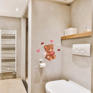 Luminous wall sticker featuring a cute brown bear holding a heart in a modern bathroom