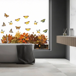 Detail of autumn butterfly static stickers on a modern glass bathroom window