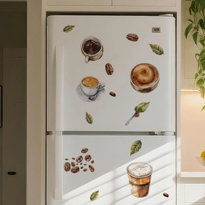 Detail showing hand-painted coffee cup wall stickers on a white double-door refrigerator