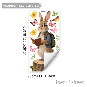 Cartoon rabbit reading book window cling decal with floral and butterfly accents